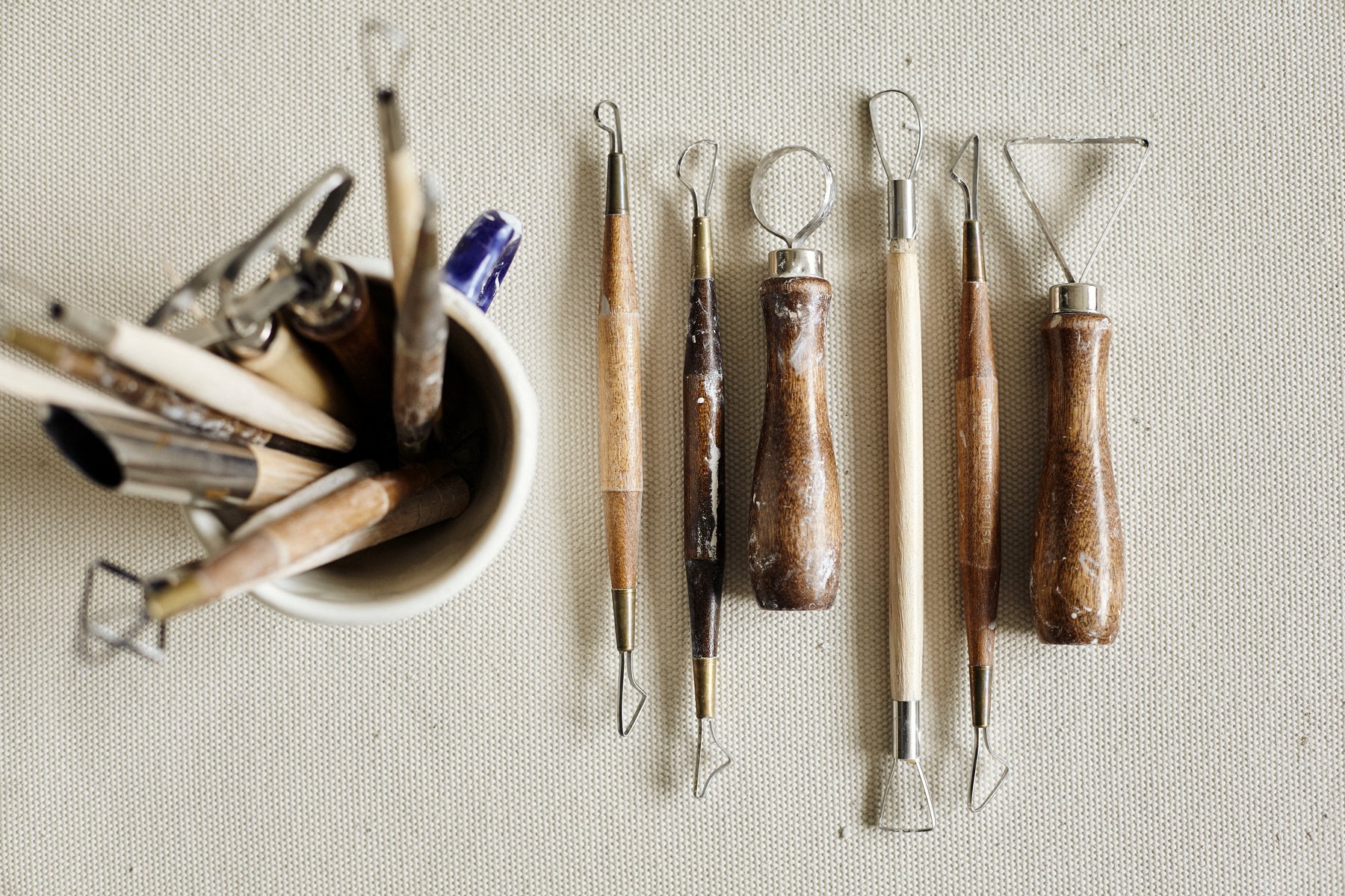 Ceramic working process with clay, tools and clay